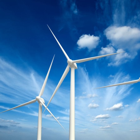 wind turbines 705x441@2x - Digital and Cloud Solutions - Impact of Opex Solutions on a CapEx Centric Utility Industry