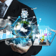 businessman holding floating tech trends thumb - Webinar - Transforming Global Organizations in a Borderless World: Enabling Digital Innovation and Operational Excellence